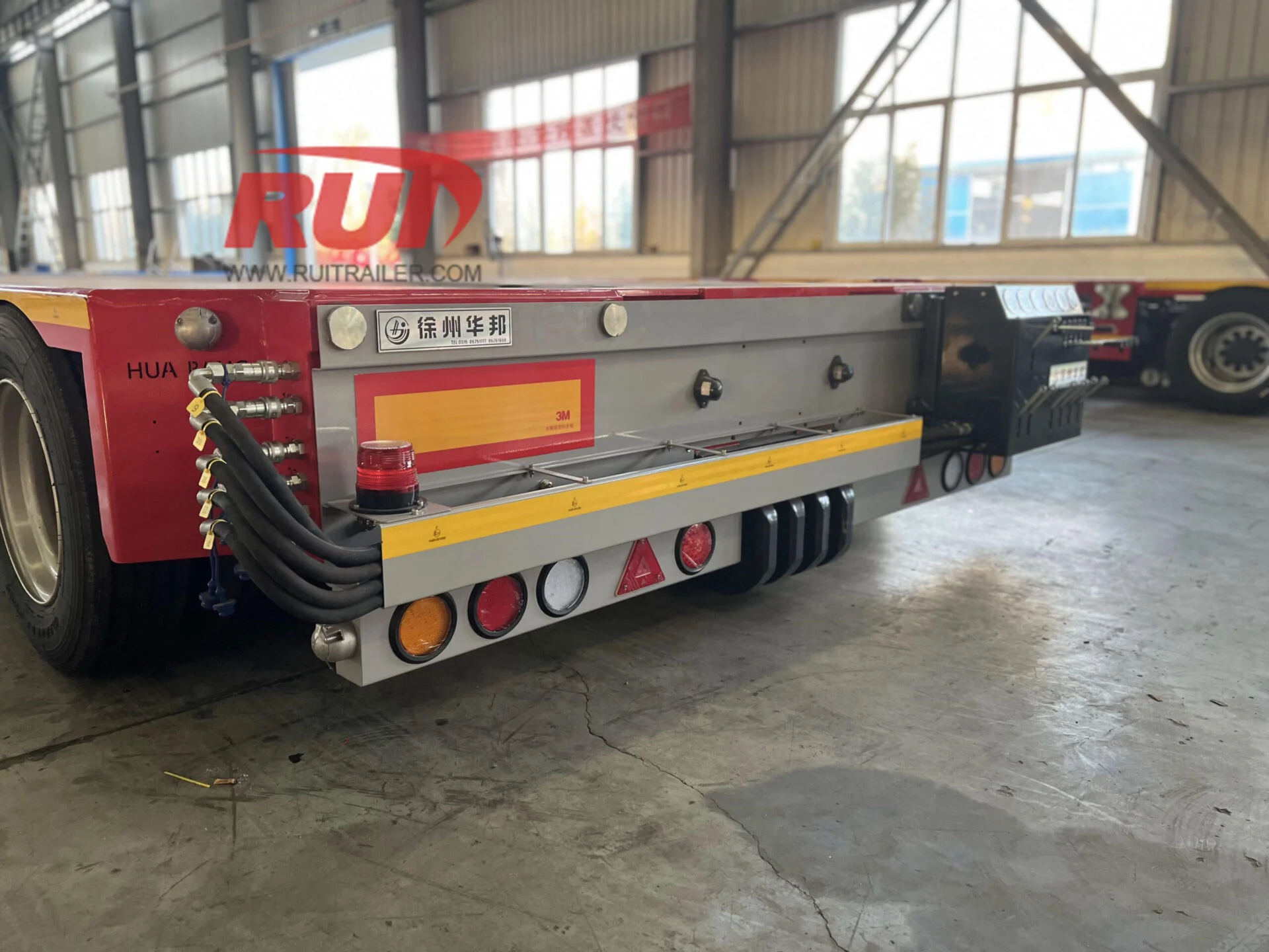 Heavy equipment loading on trailer