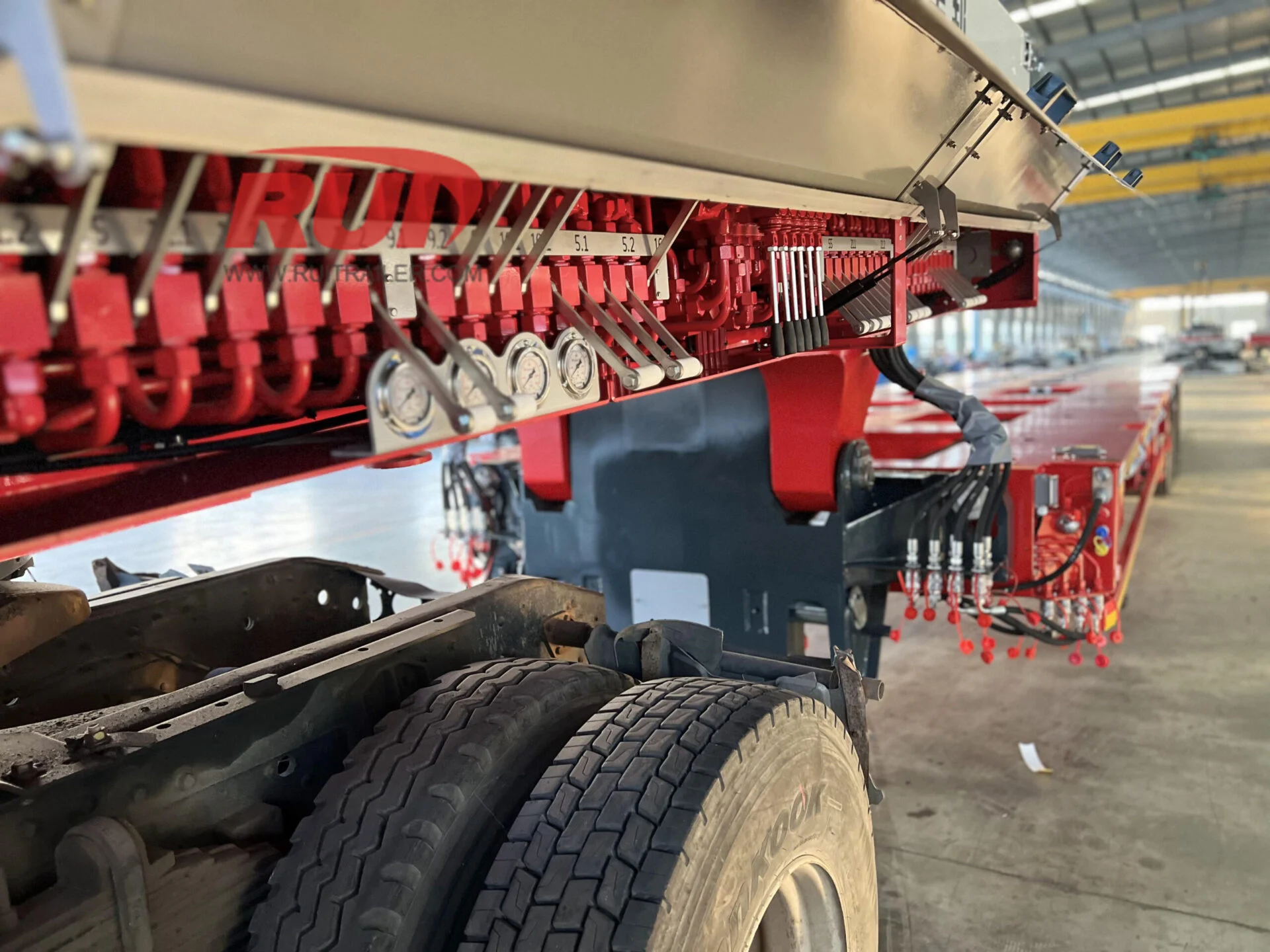 Heavy machinery load truck towing modular trailer