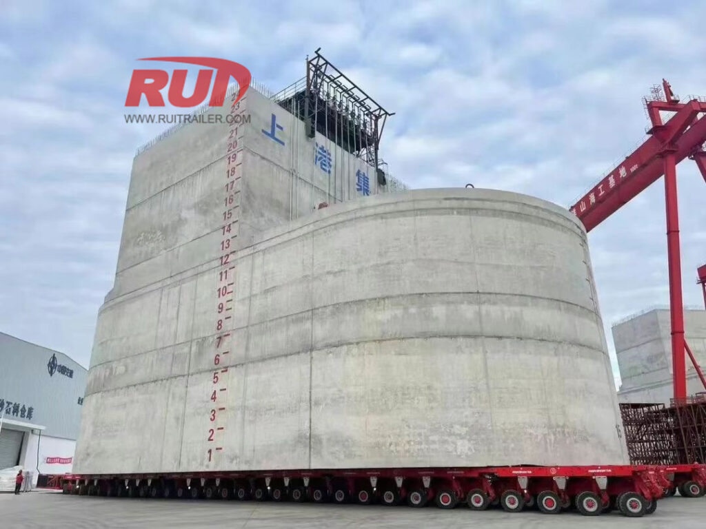 Transporteur modulaire autopropulsé (SPMT) fonctionne avec une section de pont