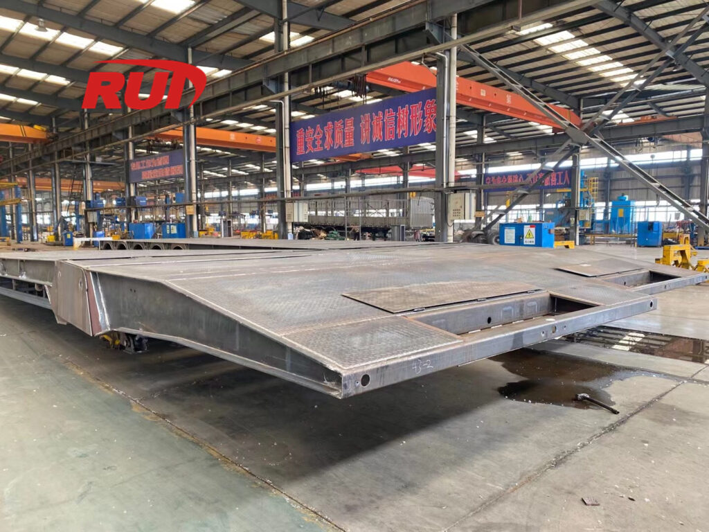front loading low boy steel structure