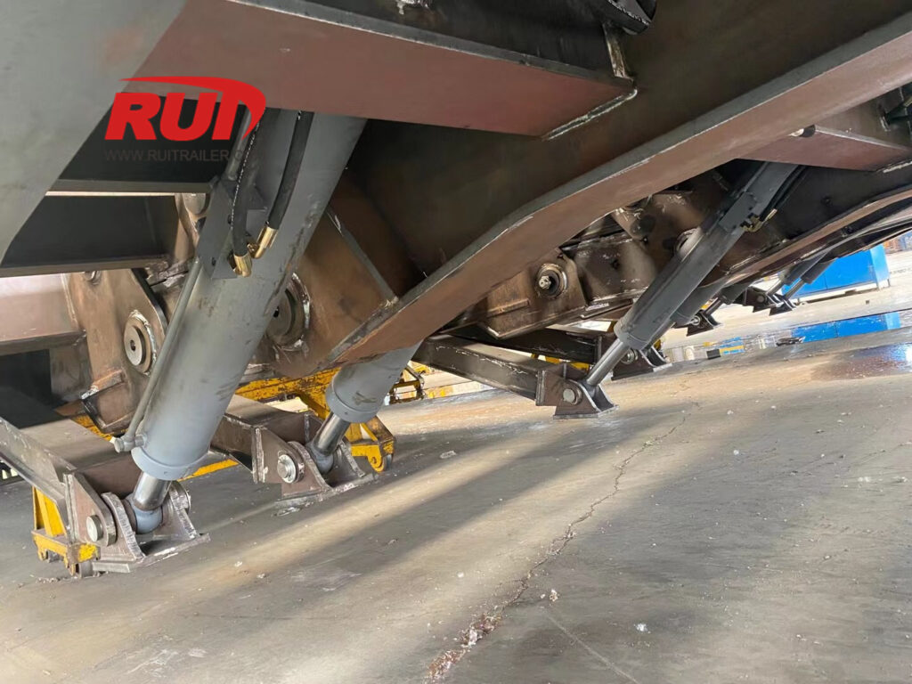 front loading low loader leg