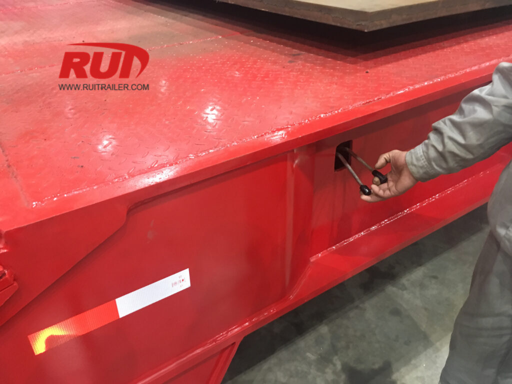 front loading low loader operation handle