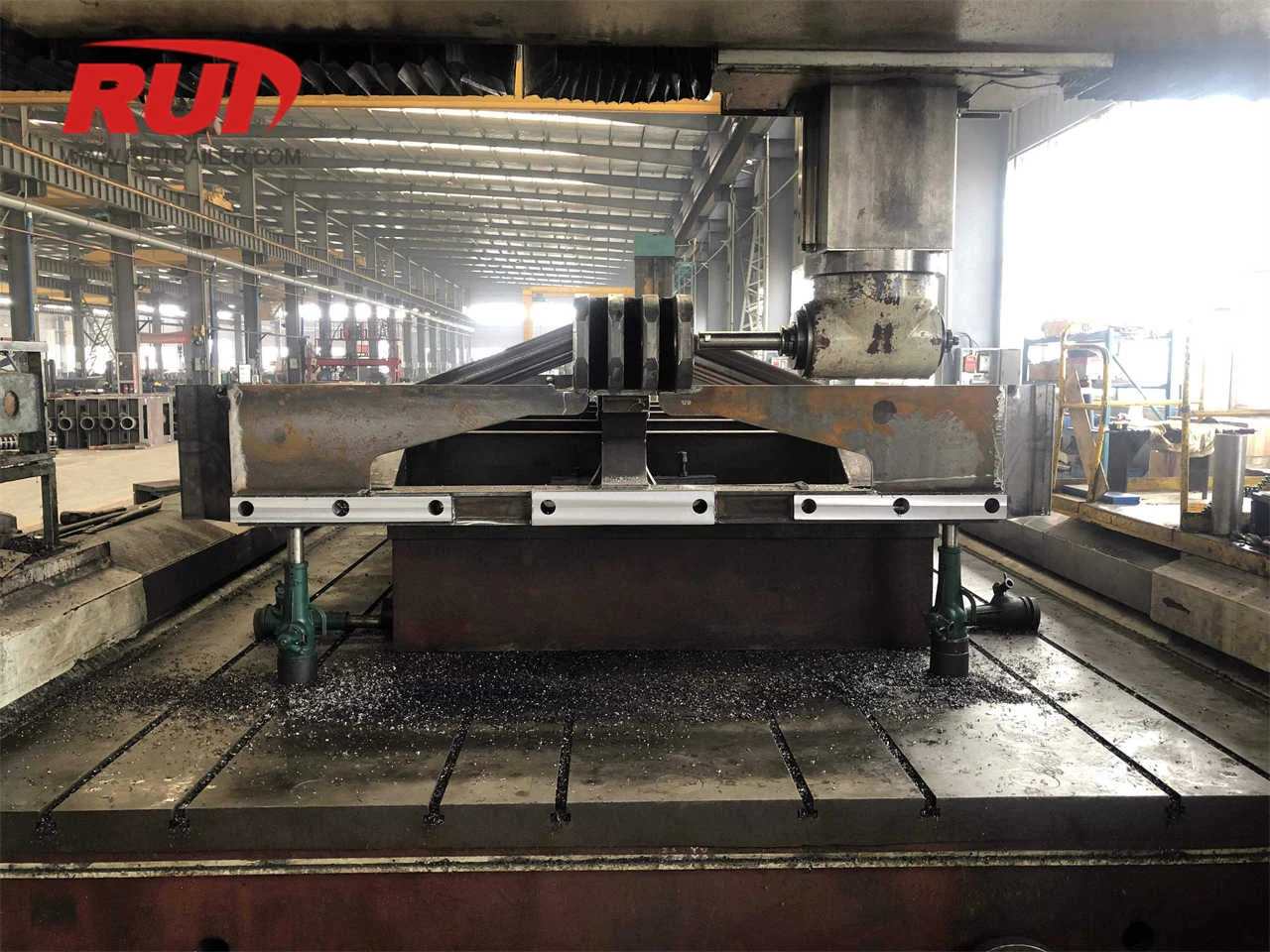 In-Process Laser Tracking for Hydraulic Modular Trailer Frame