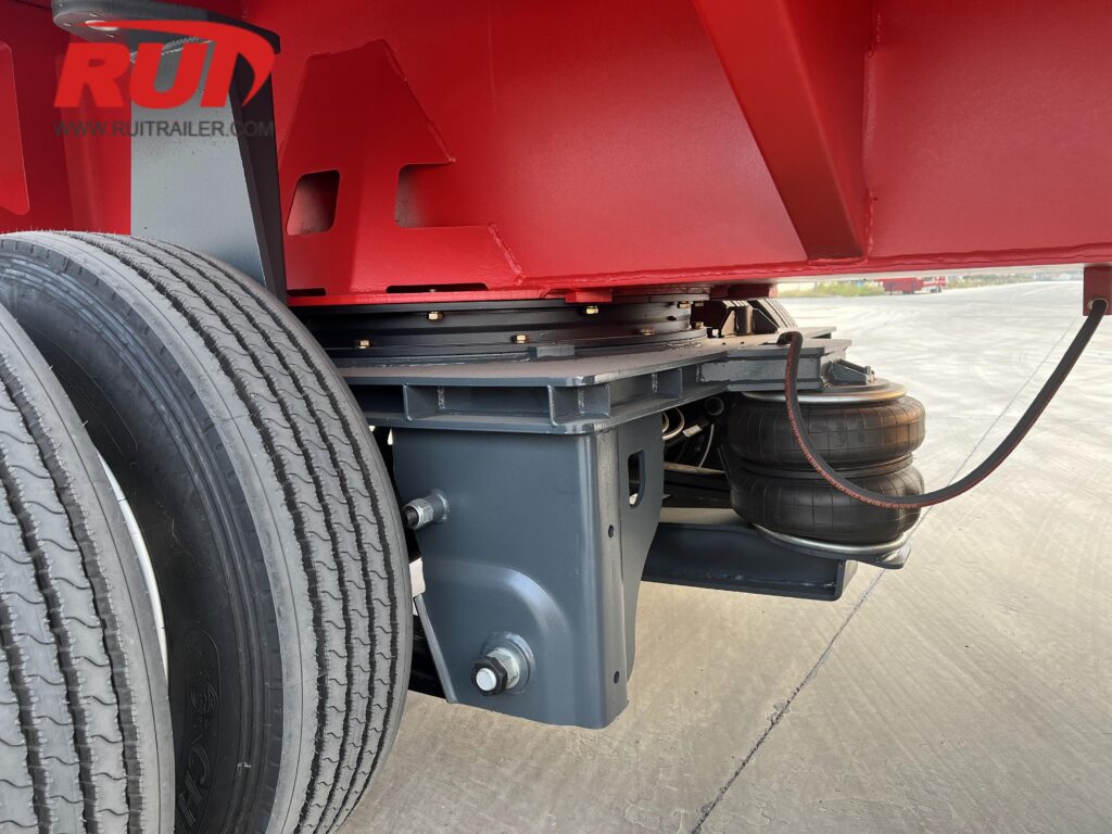 lift axle deployment for unladen return runs